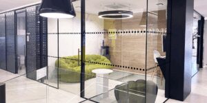 Single Glass Sliding Door with Continuous Butt Glazed Glass Wall